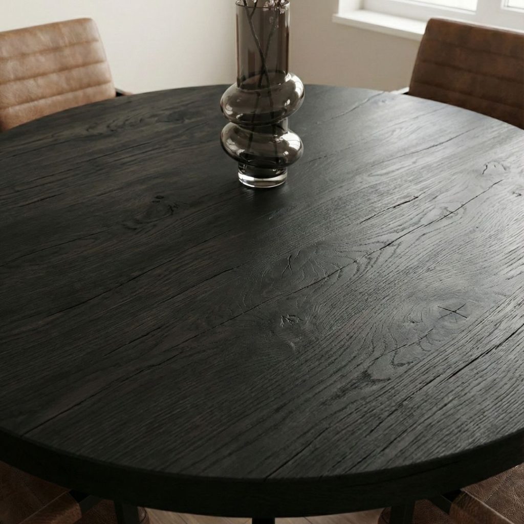 detailfoto zwart mangohouten tafelblad ronde eettafel Apeldoorn HUUS