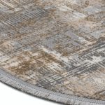 Vloerkleed detailfoto grijs en beige tinten en nette afwerking op witte achtergrond